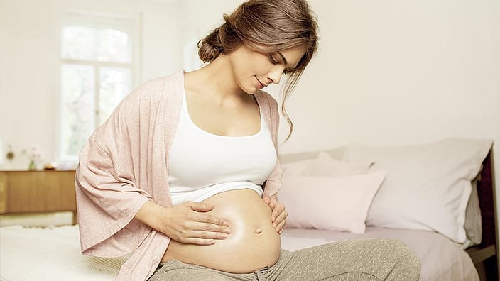 massage ventre femme enceinte
